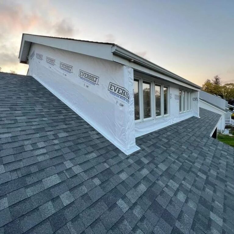 Close-up of metal roof flashing installation by ELED Construction